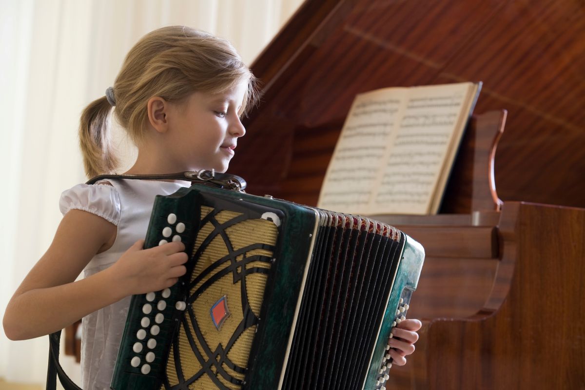 A child playing the Accordion